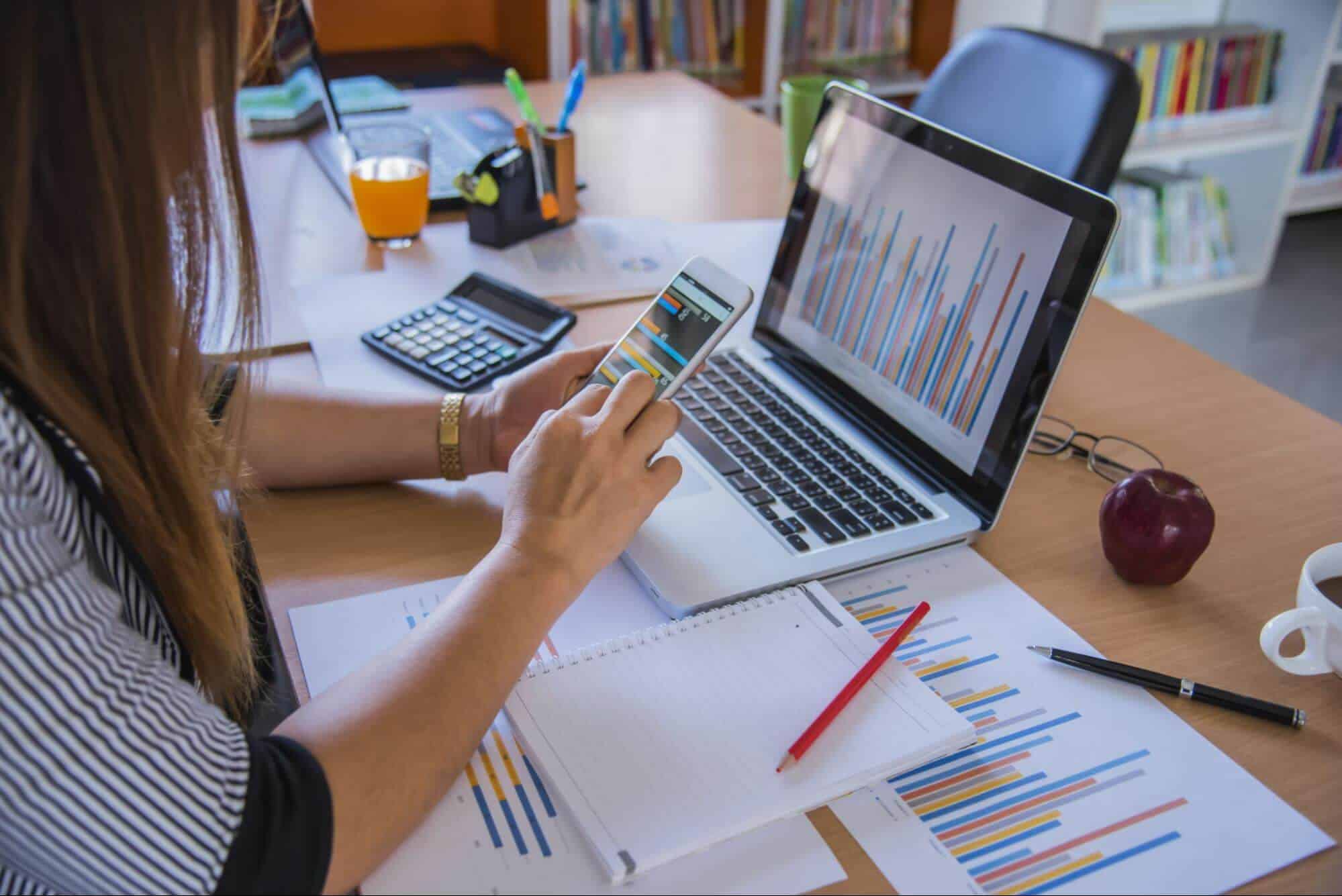 woman working on marketing reports